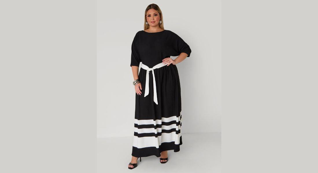 Curvy women in fashionable outfits