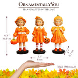 Set Of Three Pumpkin Girl Figurines