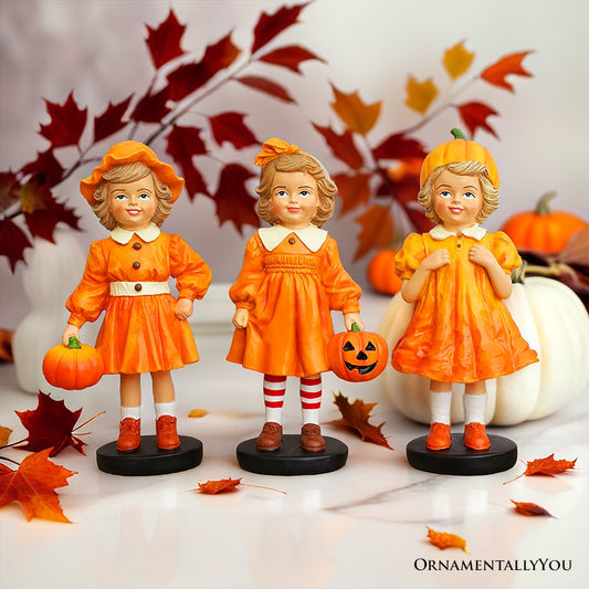 Set Of Three Pumpkin Girl Figurines