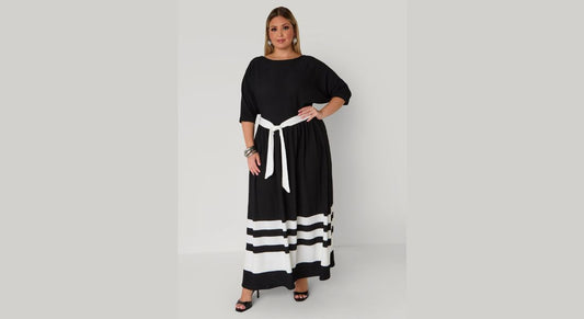 Curvy women in fashionable outfits