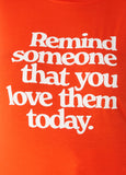 Remind Someone Graphic Tee