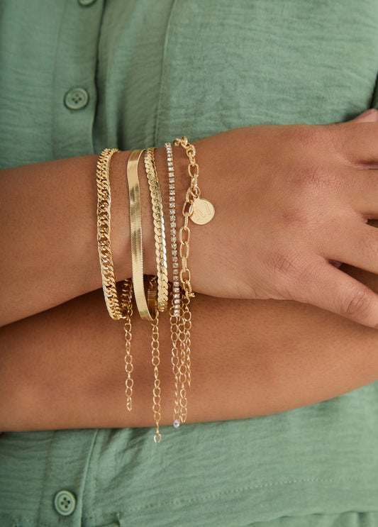 Set Of Five Gold Tone Bracelets