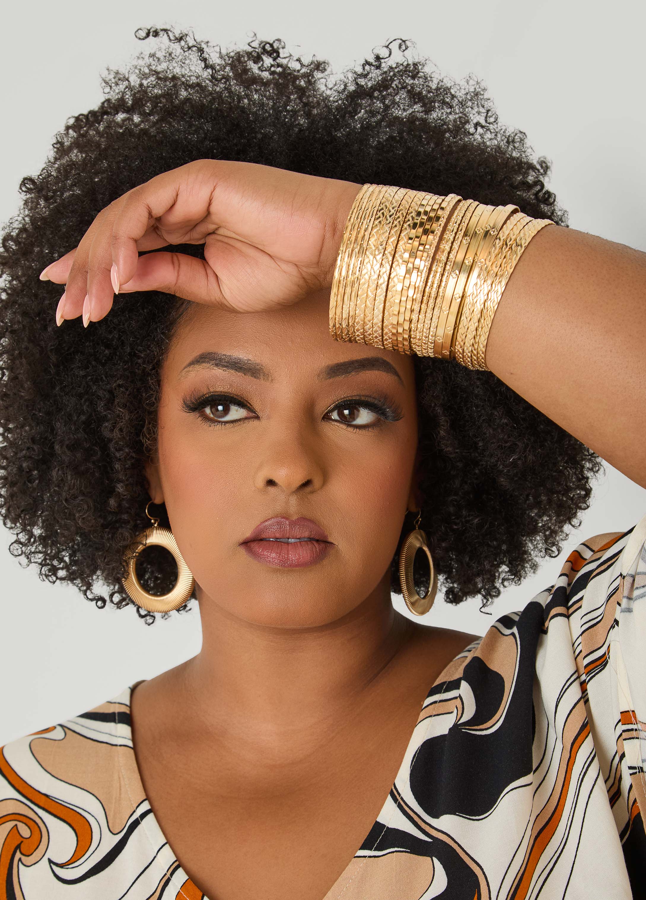 Set Of 24 Gold Tone Bangles