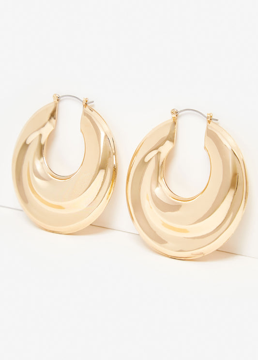 Statement jewelry puff trend gold hoop earrings fashion jewelry