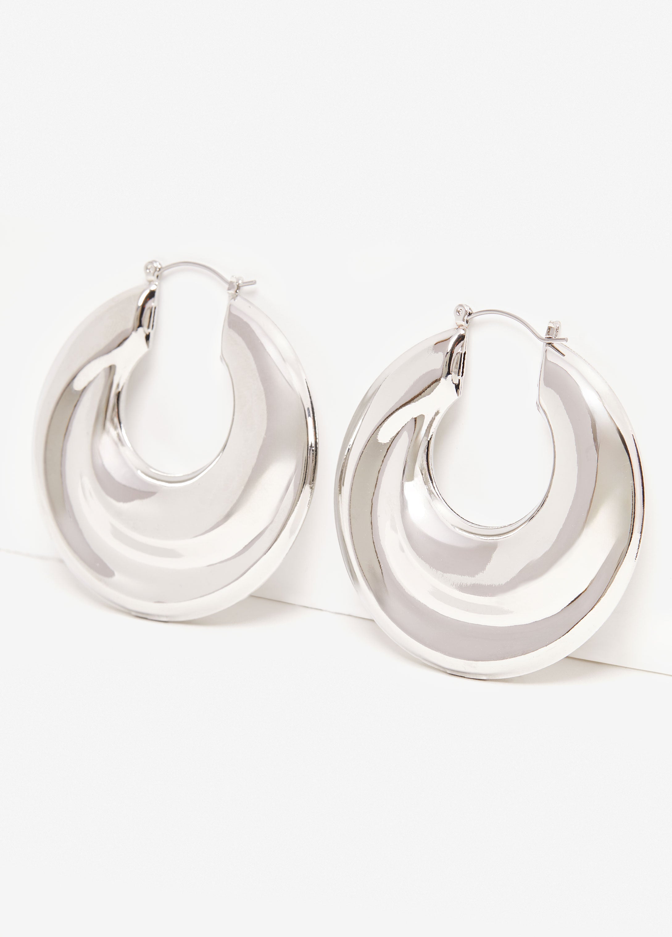 Statement jewelry puff trend silver hoop earrings fashion jewelry