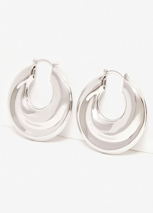 Statement jewelry puff trend silver hoop earrings fashion jewelry