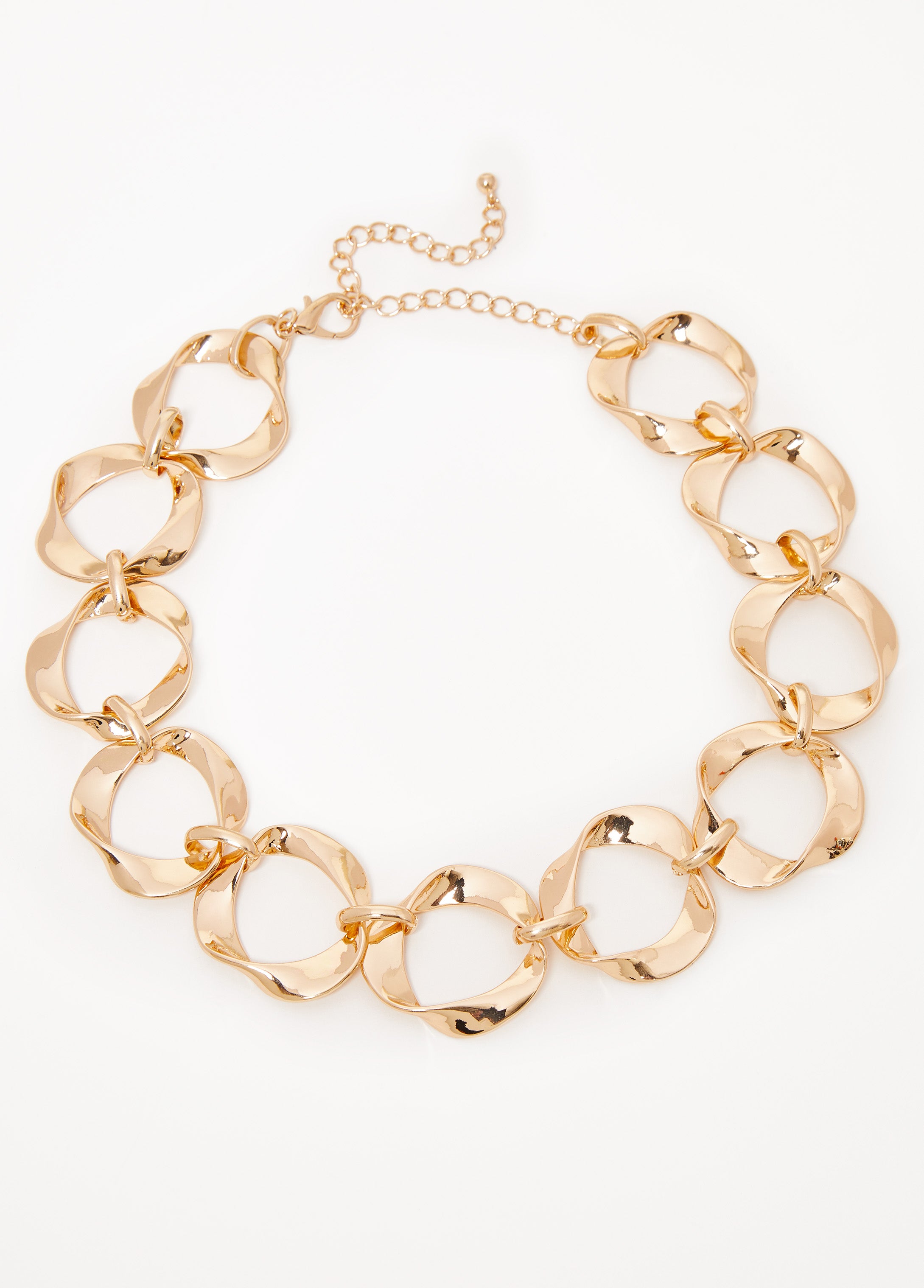 Necklace with twisted rings in gold-tone metal. Lobster-clasp fastening.