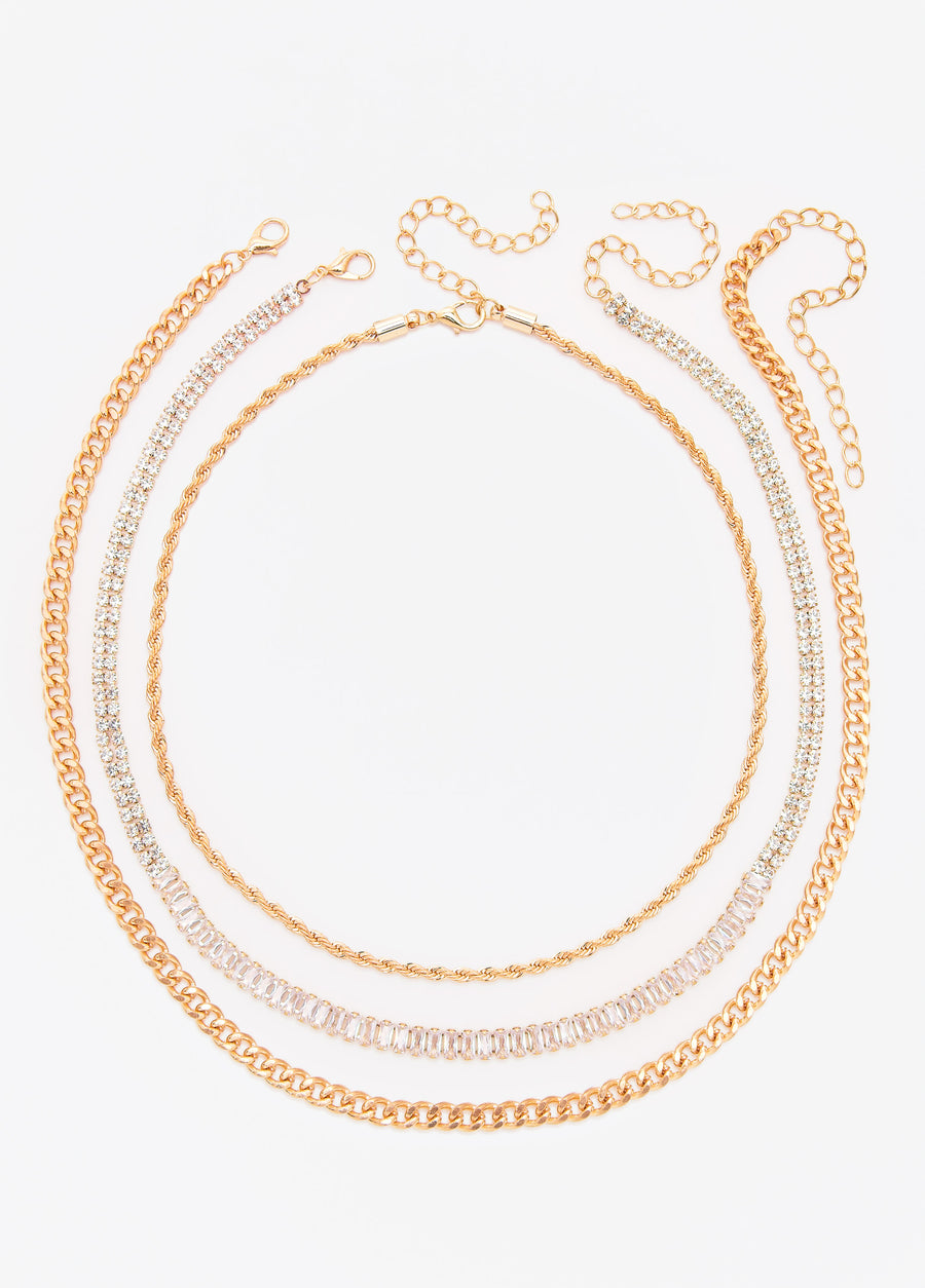 Set Of Three Gold Tone Necklaces