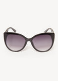 Cat eye-framed sunglasses with crystals and tinted lenses.