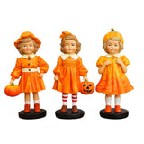 Set Of Three Pumpkin Girl Figurines