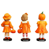 Set Of Three Pumpkin Girl Figurines